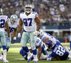 Dallas Cowboys defensive tackle Terrell McClain (97) reacts to making a second half stop of the New York Giants at AT&T Stadium in Arlington, Texas, Sunday, October 19, 2014. (Tom Fox/The Dallas Morning News)